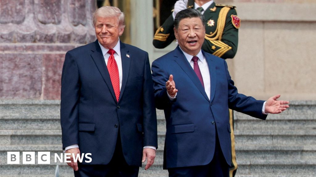 Trump Welcomed With Military Honors in Beijing as Xi Warns Taiwan Could Bring Conflict